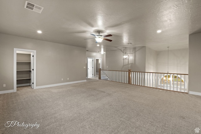 2762 E Hazel Dr, St George, UT 84790 - carpeted empty room with ceiling fan, recessed lighting, and a textured ceiling