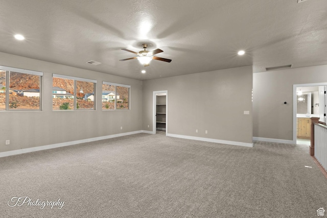 2762 E Hazel Dr, St George, UT 84790 - unfurnished room with a ceiling fan, light colored carpet, and recessed lighting