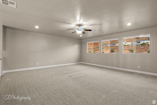 2762 E Hazel Dr, St George, UT 84790 - spare room featuring a ceiling fan, recessed lighting, light carpet, and a textured ceiling