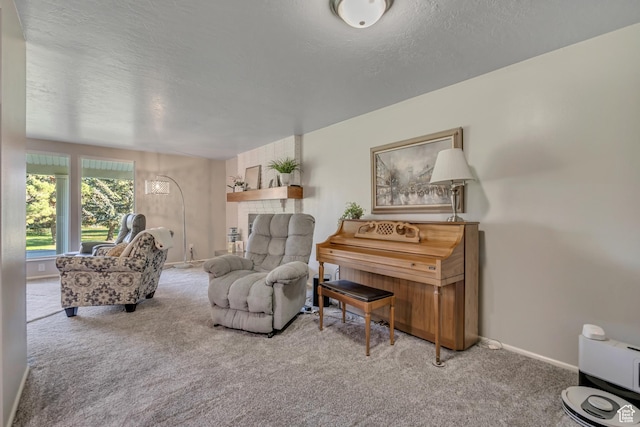 4918 E 2800 N, Eden, UT 84310 - carpeted living area featuring a textured ceiling and a tile fireplace