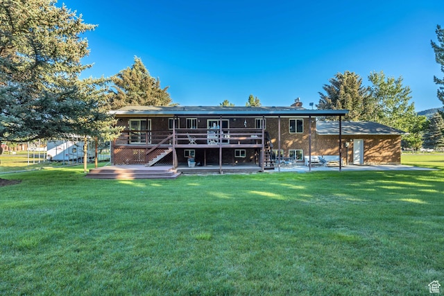 4918 E 2800 N, Eden, UT 84310 - rear view of property featuring stairway, a wooden deck, a patio area, and a yard