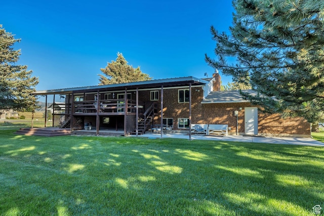 4918 E 2800 N, Eden, UT 84310 - back of property with stairs, a patio area, a deck, a lawn, and brick siding
