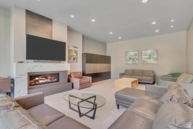 22 S Sunwood Ln, Sandy, UT 84092 - living room with recessed lighting, a premium fireplace, and carpet floors