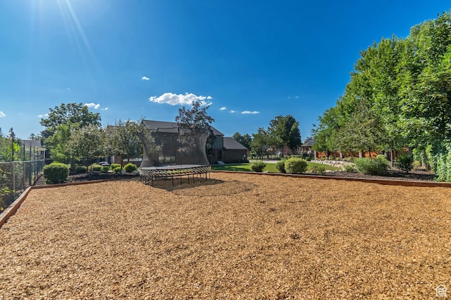 22 S Sunwood Ln, Sandy, UT 84092 - view of yard with a trampoline