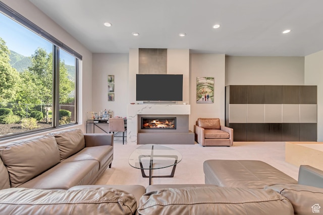 22 S Sunwood Ln, Sandy, UT 84092 - carpeted living room featuring a fireplace and recessed lighting