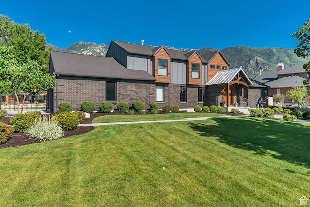 22 S Sunwood Ln, Sandy, UT 84092 - view of front of property with a mountain view and brick siding