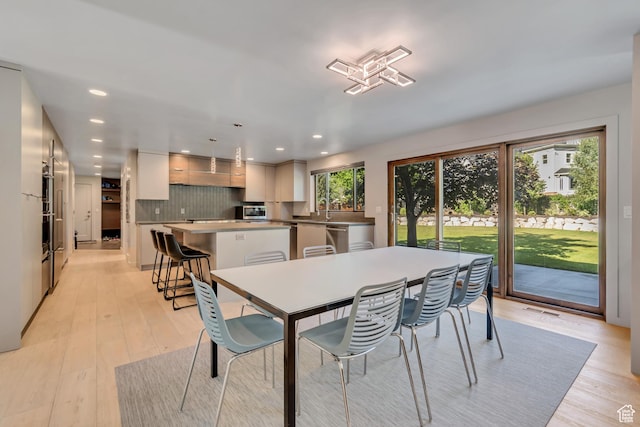 22 S Sunwood Ln, Sandy, UT 84092 - dining area featuring recessed lighting and light wood-style floors