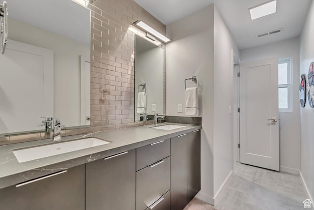 22 S Sunwood Ln, Sandy, UT 84092 - bathroom with double vanity and baseboards