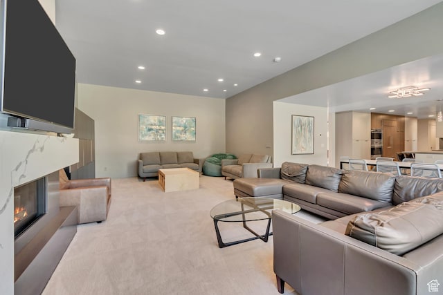 22 S Sunwood Ln, Sandy, UT 84092 - living area featuring light colored carpet, recessed lighting, and a fireplace