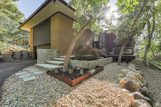 4352 S Zarahemla Dr, Salt Lake City, UT 84124 - rear view of house featuring brick siding