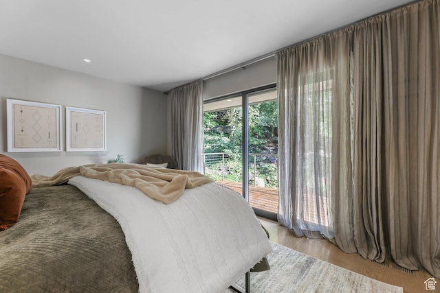 4352 S Zarahemla Dr, Salt Lake City, UT 84124 - bedroom with access to exterior, light wood-type flooring, and recessed lighting