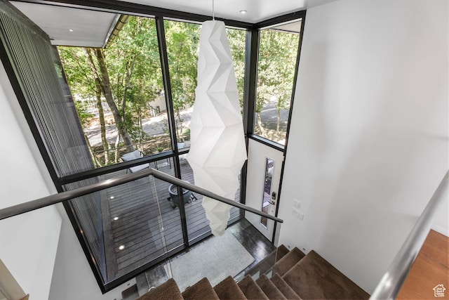 4352 S Zarahemla Dr, Salt Lake City, UT 84124 - stairway featuring expansive windows