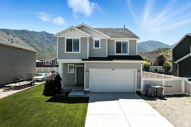 1017 S Red Cliff Dr, Santaquin, UT 84655 - view of front of home with a mountain view, a garage, and driveway