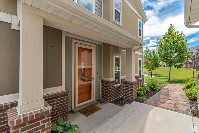 11874 S Rushmore Park Ln W, Herriman, UT 84096 - doorway to property with brick siding and stucco siding