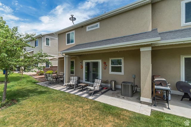 11874 S Rushmore Park Ln W, Herriman, UT 84096 - rear view of property with a patio, stucco siding, and a lawn