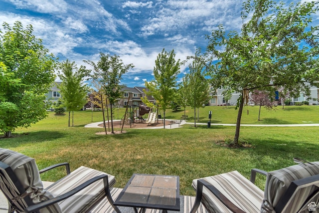 11874 S Rushmore Park Ln W, Herriman, UT 84096 - view of home's community with a playground, a lawn, and a residential view