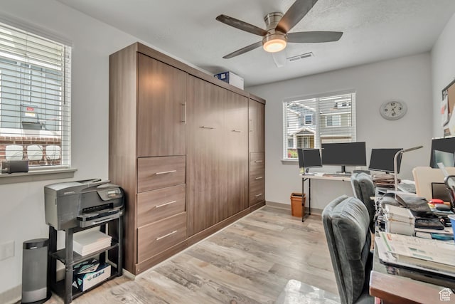 11874 S Rushmore Park Ln W, Herriman, UT 84096 - office featuring a ceiling fan and light wood-style floors