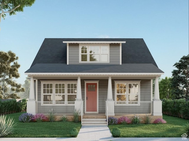 10983 S Lake Island Dr Unit 312, South Jordan, UT 84009 - view of front of home featuring a porch and a front lawn
