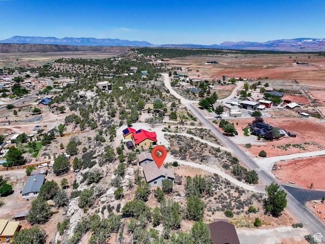 1387 N Mount Zion Dr, Apple Valley, UT 84737 - aerial view of sparsely populated area featuring a mountain backdrop and a desert landscape