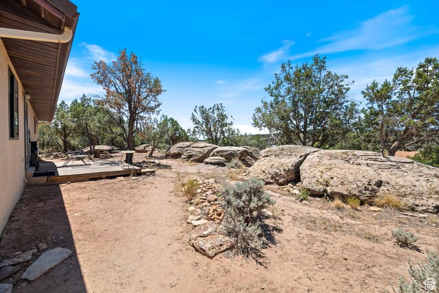 1387 N Mount Zion Dr, Apple Valley, UT 84737 - view of yard featuring a deck
