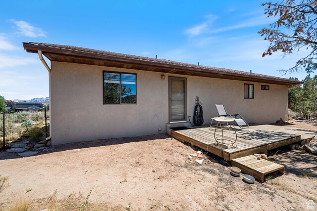 1387 N Mount Zion Dr, Apple Valley, UT 84737 - back of house with stucco siding and a deck