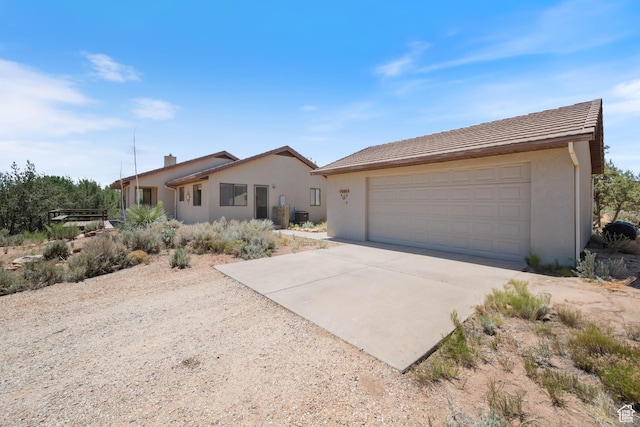 1387 N Mount Zion Dr, Apple Valley, UT 84737 - single story home with stucco siding and driveway