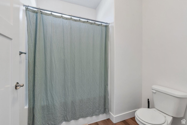 1831 W Newcastle Ln Unit 101, Saratoga Springs, UT 84045 - full bathroom featuring wood finished floors and shower / bathtub combination with curtain