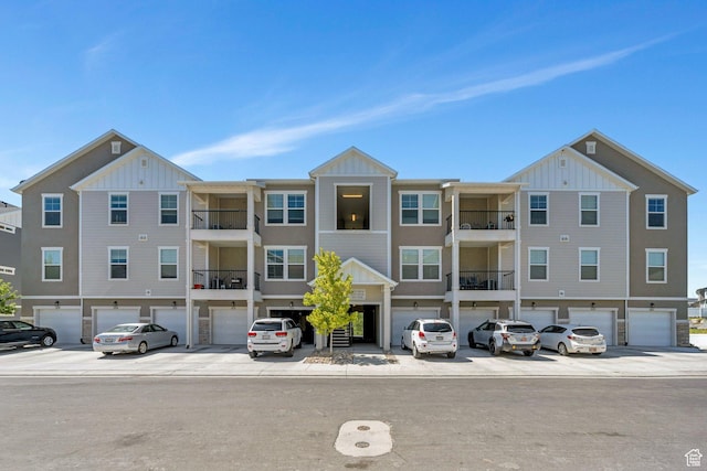 1831 W Newcastle Ln Unit 101, Saratoga Springs, UT 84045 - view of building exterior with a garage