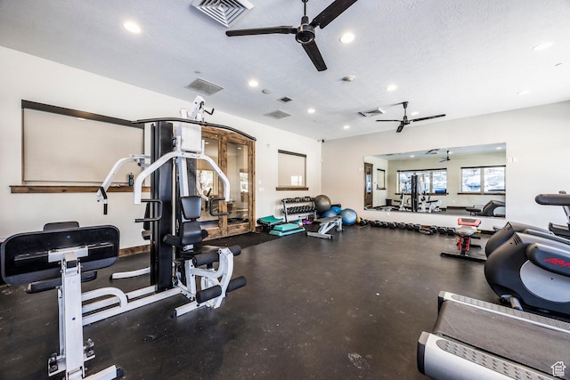 13602 N Hillclimb Ln, Kamas, UT 84036 - exercise room featuring a ceiling fan, a textured ceiling, and recessed lighting