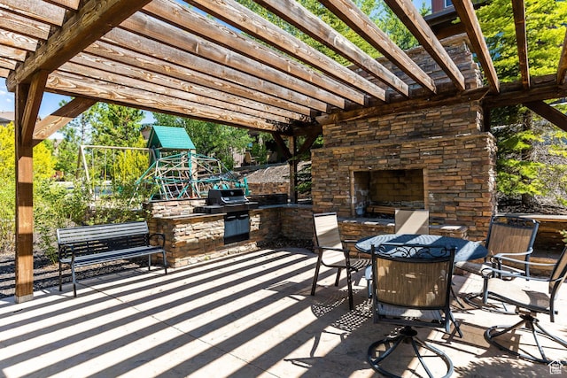 13602 N Hillclimb Ln, Kamas, UT 84036 - view of patio / terrace featuring an outdoor stone fireplace, a pergola, area for grilling, and outdoor dining area