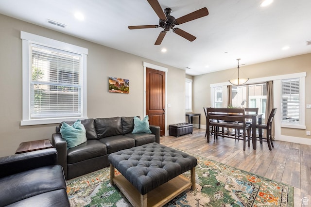 13602 N Hillclimb Ln, Kamas, UT 84036 - living room featuring ceiling fan, recessed lighting, healthy amount of natural light, and wood finished floors