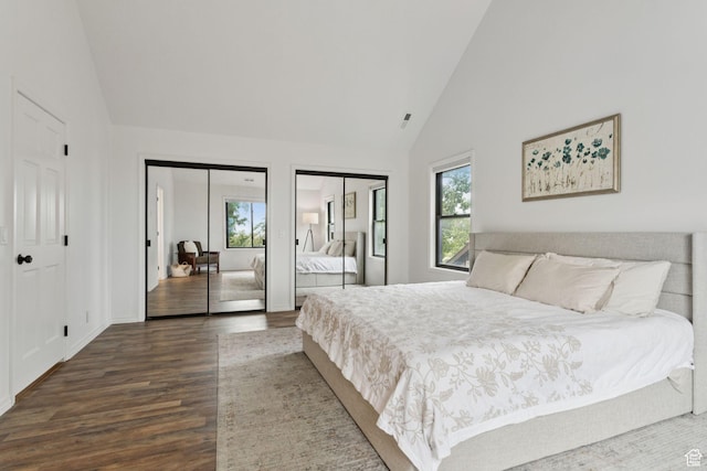 2255 E Camino Way Way S, Cottonwood Heights, UT 84121 - bedroom featuring two closets, wood finished floors, and high vaulted ceiling
