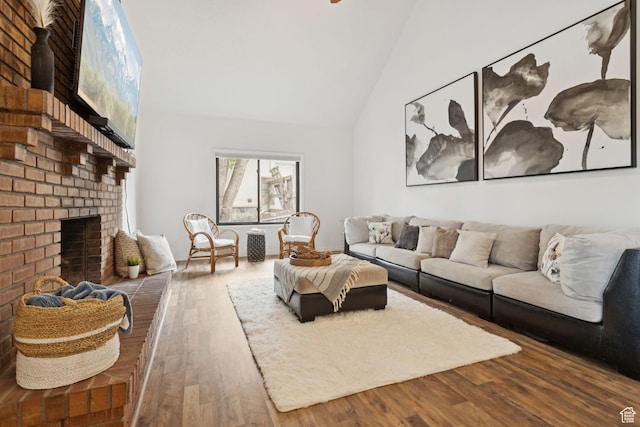 2255 E Camino Way Way S, Cottonwood Heights, UT 84121 - living room featuring wood finished floors, high vaulted ceiling, and a fireplace