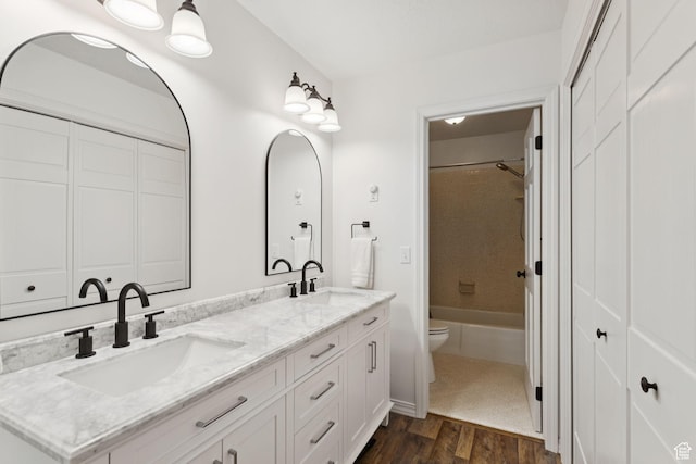 2255 E Camino Way Way S, Cottonwood Heights, UT 84121 - full bath featuring double vanity, wood finished floors, and shower / washtub combination
