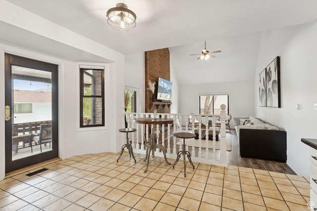 2255 E Camino Way Way S, Cottonwood Heights, UT 84121 - dining room featuring vaulted ceiling, ceiling fan, and light tile patterned floors
