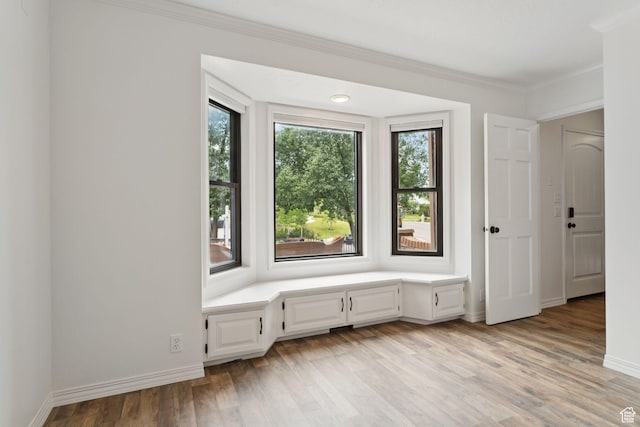 2255 E Camino Way Way S, Cottonwood Heights, UT 84121 - spare room featuring light wood-style floors, ornamental molding, and a desk