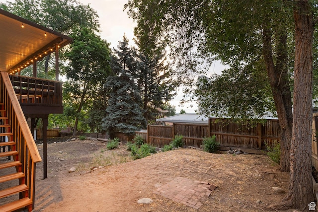 2255 E Camino Way Way S, Cottonwood Heights, UT 84121 - fenced backyard featuring stairs and a deck
