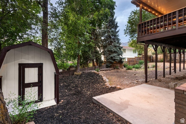 2255 E Camino Way Way S, Cottonwood Heights, UT 84121 - fenced backyard featuring a patio area and a storage shed