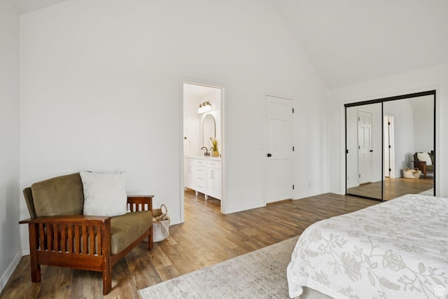 2255 E Camino Way Way S, Cottonwood Heights, UT 84121 - bedroom featuring wood finished floors, high vaulted ceiling, and ensuite bathroom