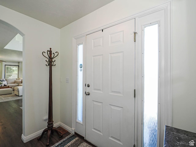 1152 E Gavin Cir, Draper, UT 84020 - entrance foyer with arched walkways and dark wood-type flooring