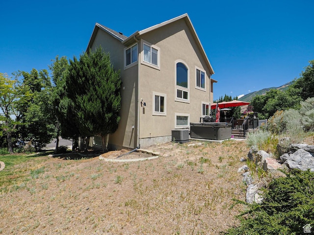 1152 E Gavin Cir, Draper, UT 84020 - back of property with stucco siding and a wooden deck