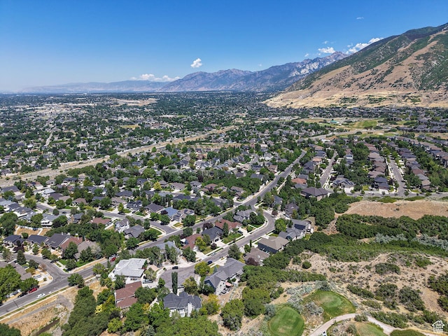 1152 E Gavin Cir, Draper, UT 84020 - aerial view of property and surrounding area featuring a mountainous background and nearby suburban area