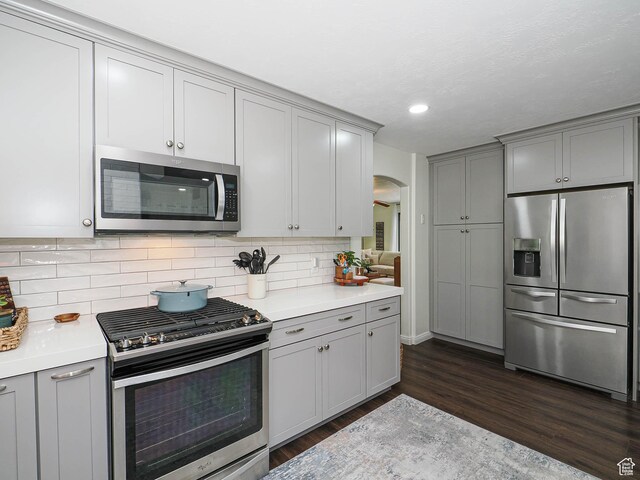 1152 E Gavin Cir, Draper, UT 84020 - kitchen with stainless steel appliances, gray cabinets, dark wood finished floors, and recessed lighting