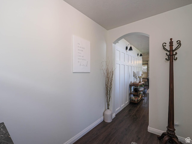 1152 E Gavin Cir, Draper, UT 84020 - hallway with arched walkways and dark wood-style flooring