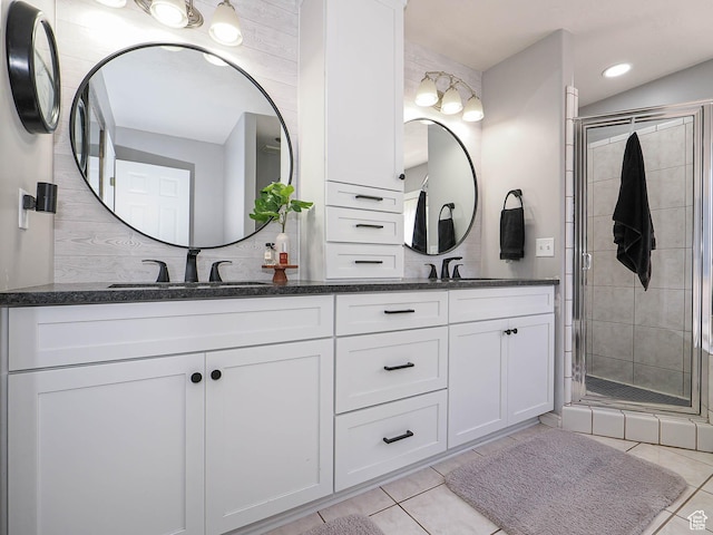 1152 E Gavin Cir, Draper, UT 84020 - bathroom featuring double vanity, a shower stall, tile patterned floors, and recessed lighting