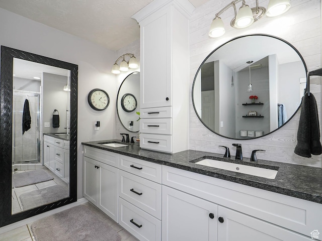 1152 E Gavin Cir, Draper, UT 84020 - bathroom with double vanity, a stall shower, and tile patterned floors