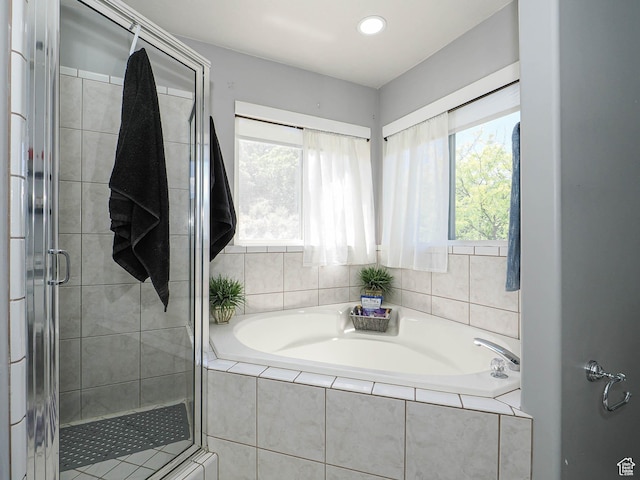 1152 E Gavin Cir, Draper, UT 84020 - bathroom featuring a garden tub, a stall shower, healthy amount of natural light, and recessed lighting