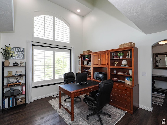 1152 E Gavin Cir, Draper, UT 84020 - office area with dark wood finished floors, a towering ceiling, arched walkways, and recessed lighting