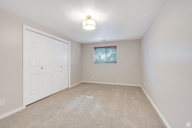 421 S 1400 E, Fruit Heights, UT 84037 - unfurnished bedroom featuring carpet flooring and a closet