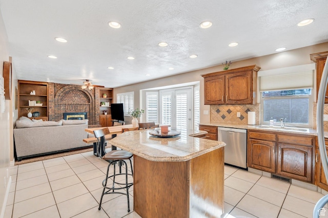 421 S 1400 E, Fruit Heights, UT 84037 - kitchen featuring dishwasher, a kitchen breakfast bar, healthy amount of natural light, a center island, and recessed lighting